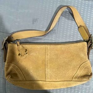 Tan suede coach pocket book
